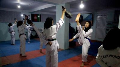Taekwondo team members practice during a training session in Kabul, Afghanistan. AP
