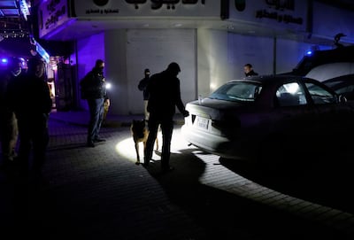 A car belonging to the militants is inspected by anti-terrorism police in Ramtha, Jordan on Tuesday. Getty Images