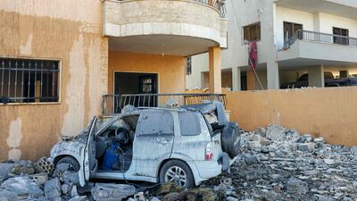 A car surrounded by rubble after Israeli strikes on Ali Al Nahri in Lebanon's eastern Bekaa Valley. AFP