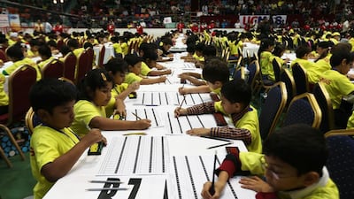 A total of 1,500 children, mainly from Indian schools in Dubai, participated in the maths challenge on Friday. Pawan Singh / The National
