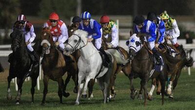 Olivier Peslier riding Seraphin Du Paon, second from left.