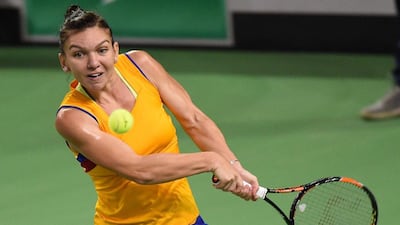 Simona Halep returns a shot in a Fed Cup tennis match at Sala Polivalenta Cluj Napoca hall in Cluj Napoca City, on February 7, 2016. (AFP/DANIEL MIHAILESCU)