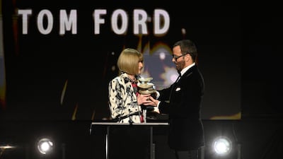 Anna Wintour presents the Outstanding Achievement award to Tom Ford