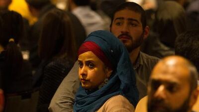 6.08pm - Tasneem watches on as the official proceedings get under way at the 2015 Australian Football League Ramadan Dinner.
