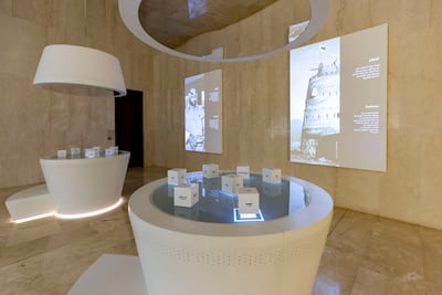 Slide the blocks to unlock new information on the country's unification. Chris Whiteoak / The National