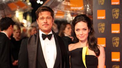 Brad Pitt, in Tom Ford, and Angelina Jolie arrive for the Orange British Academy Film Awards at the Royal Opera House on February 8, 2009 in London, England. Getty Images
