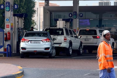 Drivers stop at a petrol station in the Qatari capital Doha. AFP