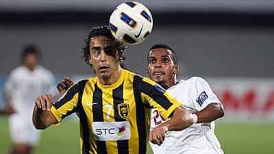 Al Wahda’s Mahmoud al Hammadi, right, tussles with Al Ittihad’s Paulo Jorge during the teams’ corresponding fixture on April 5, which Wahda lost 3-0. The two face each other again tonight.