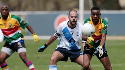 Team South Africa plays against team Galicia during their Gaelic football match during the GAA World Games at Zayed Sports City in Abu Dhabi on March 6, 2015. Christopher Pike / The National