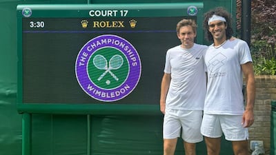 Skander Mansouri, right, and Nicolas Mahut at Wimbledon. Photo: Skander Mansouri