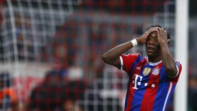Bayern Munich's David Alaba reacts after missing a chance to score, before later picking up an injury, during his side's Champions League win over AS Roma on Wednesday night. Michael Dalder / Reuters / November 5, 2014