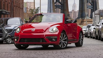 The new Volkswagen Beetle Cabriolet takes to the street in the United States. Its softtop can be lowered in 9.5 seconds at speeds of up to 50kph, while its 2.0L engine produces 210bhp. Courtesy Volkswagen