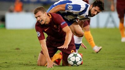 AS Roma’s Edin Dzeko in action against FC Porto’s Felipe. Max Rossi / Reuters
