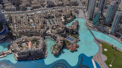 Downtown Dubai seen from Burj Khalifa. The emirate's entrepreneurial ecosystem, global connectivity and lifestyle attract international talent and capital, according to Savills. Antonie Robertson / The National