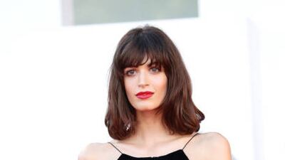 Greta Ferro, in a cut-out black gown, attends the red carpet for 'Madres Paralelas' during the 78th Venice International Film Festival on September 1, 2021. Getty Images