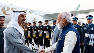 Sheikh Hamdan bin Mohamed is greeted by Mr Modi