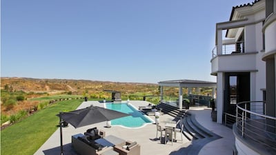 Its top-floor lounge has a 360-degree view of the surrounding area including the coast, an outdoor dining area and a swimming pool. Courtesy Kensington Exclusive Properties