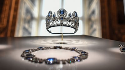 A sapphire tiara, necklace and earring set, which was once worn by French queens Hortense and Marie-Amelie, were among the jewels stolen from Louvre Museum in Paris. AFP