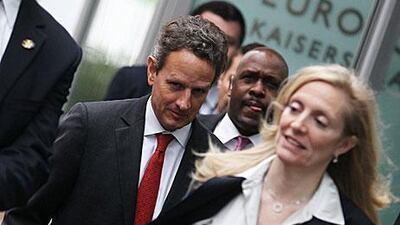 The US treasury secretary Timothy Geithner, centre, leaves the headquarters of the European Central Bank in Frankfurt yesterday. In addition to the bank’s president, Mario Draghi, Mr Geithner is scheduled to meet the Bundesbank president and a number of German government officials.