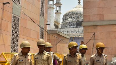 Policemen stand guard near the Gyanvapi mosque, in May. AFP