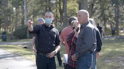 Drake, left, and Willis on the set of American Siege (2021)