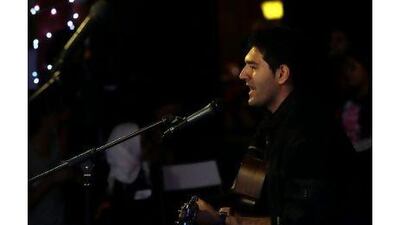 Waheed performs during the GYEM open microphone night in Dubai.