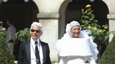 Linda Evangelista, as the featured model on the day, was cocooned in white for the Chanel autumn / winter 2003 haute couture collection. AFP