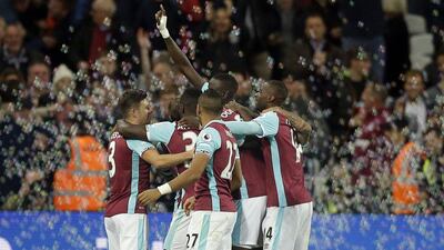 Alastair Grant / AP Photo