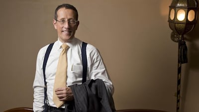 Richard Quest likes “lots of jokes, noise and atmospehere” in the CNN studio before Quest Means Busines” goes on air. Antonie Robertson / The National