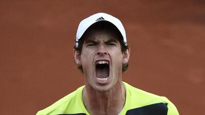 Andy Murray celebrates his victory over Gael Monfils at the end of their French Open quarter-final match at Roland Garros in Paris on June 4, 2014. Pascal Guyot / AFP