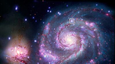 A composite image of M51 with X-rays from Chandra and optical light from Nasa's Hubble Space Telescope contains a box that marks the location of a possible planet. Photo: Nasa