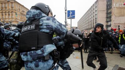Law enforcement officers clash with protesters during a rally in support of jailed Russian opposition leader Alexei Navalny in Moscow. Reuters