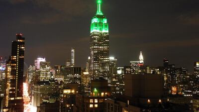 The Empire State Building is lit in green in New York City to celebrate the Eid Al Fitr holiday that marks the end of Ramadan. The Empire State Building famously shines specific colors for a number of religious holidays – pastel shades for Easter, blue and white for Hanukkah, and red and green for Christmas. Brigitte Dusseau / AFP photo