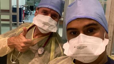 Dr Saad Al Ameri, right, and a colleague at Sheikh Khalifa Medical City. Saad Al Ameri