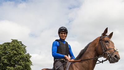 Bahraini jockey Ebrahim Nader prepares to ride out.