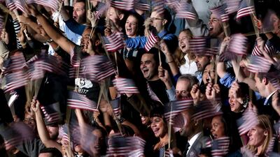 Supporters of US President Barack Obama cheer as they wait for him to appear on stage for his victory speech at McCormick Place in Chicago, Illinois. Spencer Platt / Reuters