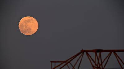 Photography lecturer and stargazer, Basel Badran, said he was disappointed he could not get a picture when the moon was low on the horizon due to the hazy conditions. Sarah Dea / The National
