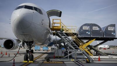 Ground crew members load cargo into an Amazon Prime Air aircraft at the company's Air Hub in Cincinnati, US. Bloomberg