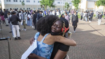Pupils celebrate at Brampton Manor Academy in London.