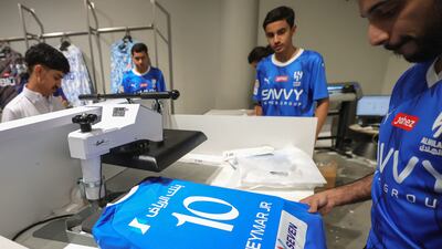 Al Hilal jerseys bearing the name and number of their latest star signing - Brazilian forward Neymar. AFP