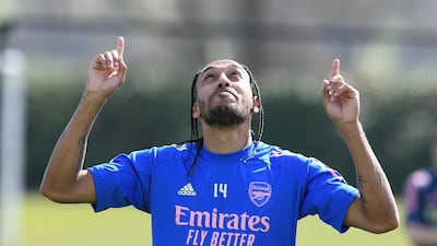 Pierre-Emerick Aubameyang celebrates during Arsenal training. Getty