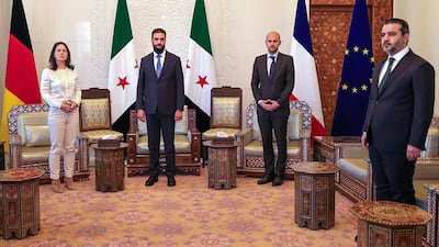 Syria's President Ahmad Al Shara, second left, with French Foreign Minister Jean-Noel Barrot, second right, and Germany's Foreign Minister Annalena Baerbock, left, in Damascus in January. The meeting was also attended by Syrian Foreign Minister Asaad Al Shibani. AFP