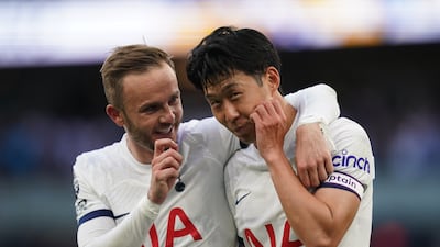 Tottenham Hotspur's Son Heung-min, right, and James Maddison hug after the Premier League win over Man United. PA