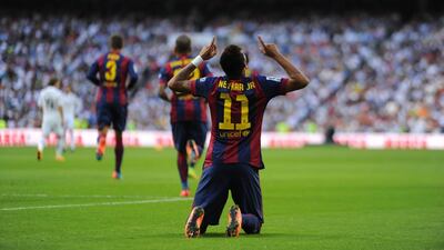 Neymar celebrates after scoring Barcelona's first and only goal in a 3-1 loss to Real Madrid in Saturday's 'El Clasico'. Denis Doyle / Getty Images