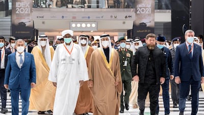 Sheikh Mansour bin Zayed tours the 2021 International Defence Exhibition and Conference at Abu Dhabi National Exhibition Centre. Seen with Ramzan Kadyrov, President of Chechnya. Hamad Al Kaabi / Ministry of Presidential Affairs
