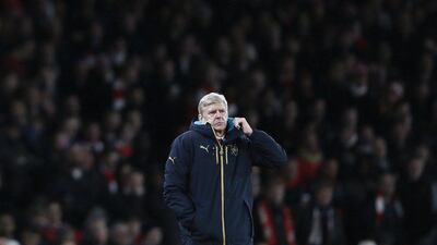 Arsenal manager Arsene Wenger observes his team during their Champions League match against Dynamo Zagreb on Tuesday night. Stefan Wermuth / Reuters