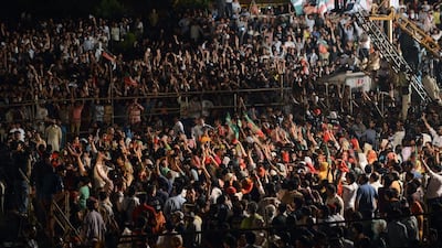 Supporters of Imran Khan stage a protest in front of the Parliament in Islamabad. Farooq Naeem / AFP