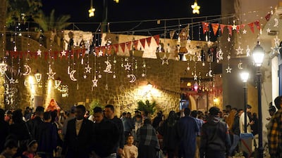 Libyans gather in Tripoli following iftar. AFP