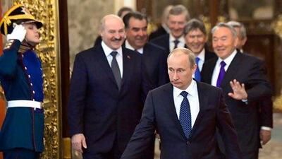 Vladimir Putin, front, with leaders of former Soviet republics in Moscow. In his state-of-the-nation speech last week, the Russian president pledged to fight corruption and end the impression of the elite being "an isolated caste". Kirill Kudryavtsev / AFP