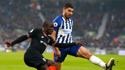 Chelsea's N'Golo Kante, left, vies for the ball with Brighton & Hove Albion's Neal Maupay. EPA